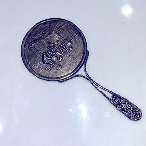 Antique handheld mirror
